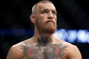 conor-mcgregor-charged-after-attacking-ufc-bus