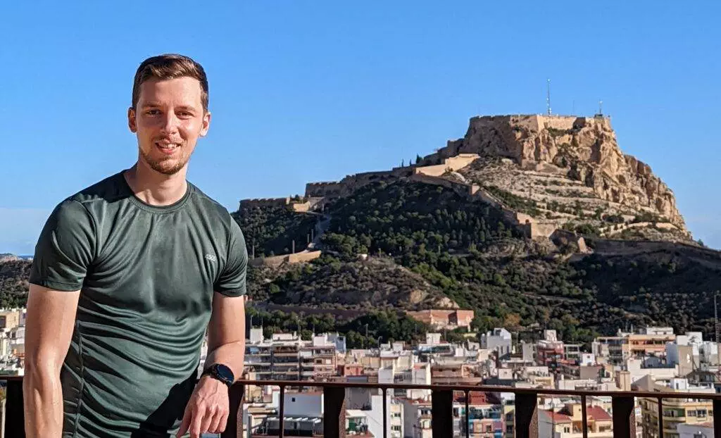 A picture of Cristian - founder of TheSportWriter.com - in Alicante with Santa Barbara Castle in the background.